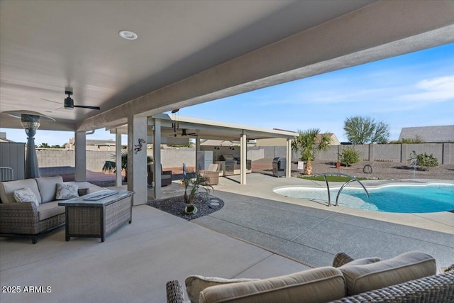 view of pool featuring a ceiling fan, an outdoor living space, a fenced backyard, a fenced in pool, and a patio area