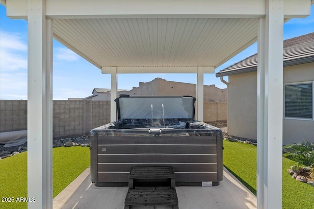 view of patio / terrace featuring fence