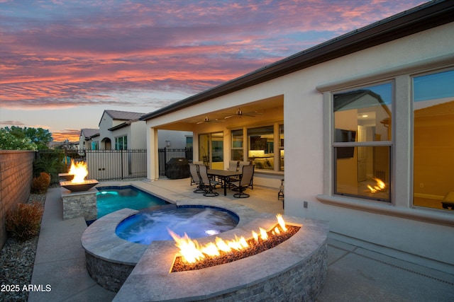 644 E Las Puertas Ln, Queen Creek, AZ 85140 - view of pool featuring a fenced backyard, a fenced in pool, a fire pit, and a patio