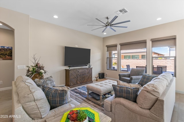 644 E Las Puertas Ln, Queen Creek, AZ 85140 - living area featuring visible vents, baseboards, arched walkways, ceiling fan, and recessed lighting