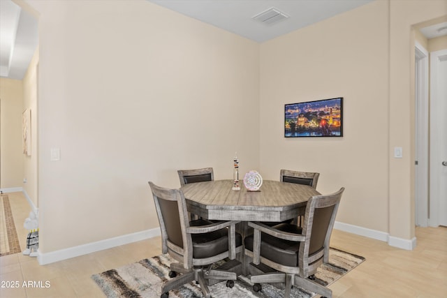 644 E Las Puertas Ln, Queen Creek, AZ 85140 - dining room featuring baseboards and visible vents