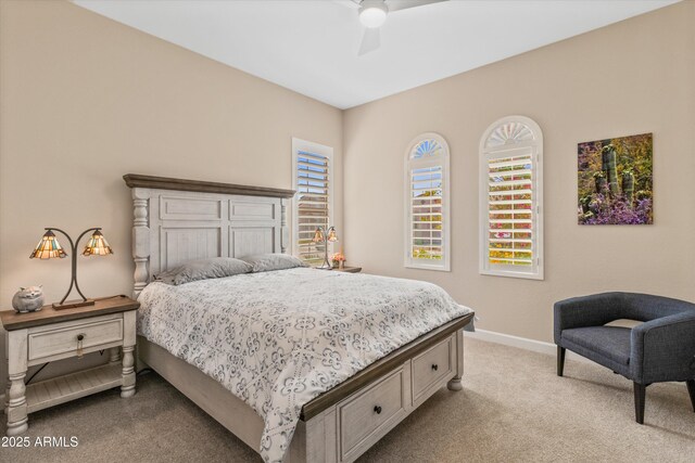 644 E Las Puertas Ln, Queen Creek, AZ 85140 - bedroom featuring ceiling fan, baseboards, and carpet
