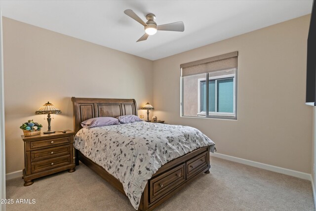 644 E Las Puertas Ln, Queen Creek, AZ 85140 - bedroom featuring baseboards, ceiling fan, and light carpet