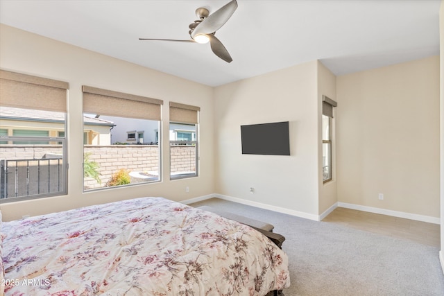 644 E Las Puertas Ln, Queen Creek, AZ 85140 - bedroom featuring carpet floors, baseboards, and a ceiling fan