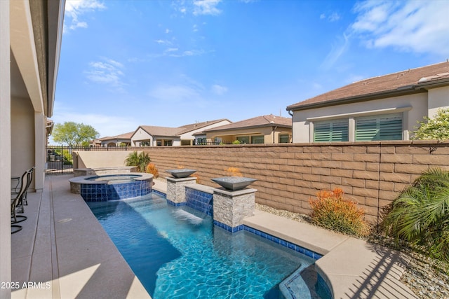 644 E Las Puertas Ln, Queen Creek, AZ 85140 - view of pool featuring a pool with connected hot tub, a fenced backyard, and a patio area