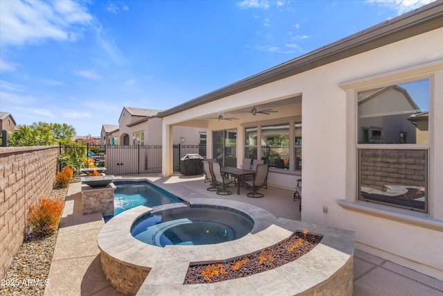 644 E Las Puertas Ln, Queen Creek, AZ 85140 - view of pool featuring a patio area, a pool with connected hot tub, a fenced backyard, and a ceiling fan