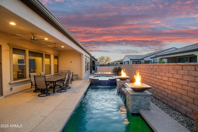 644 E Las Puertas Ln, Queen Creek, AZ 85140 - view of swimming pool with a patio, a pool with connected hot tub, fence, and a ceiling fan