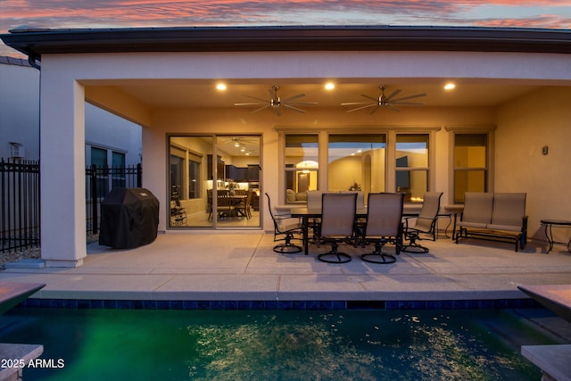 644 E Las Puertas Ln, Queen Creek, AZ 85140 - rear view of property featuring a patio area, an outdoor pool, fence, and stucco siding