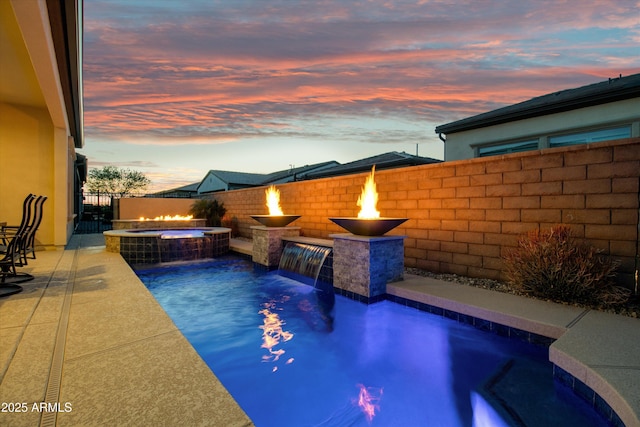 644 E Las Puertas Ln, Queen Creek, AZ 85140 - view of pool with a pool with connected hot tub and fence