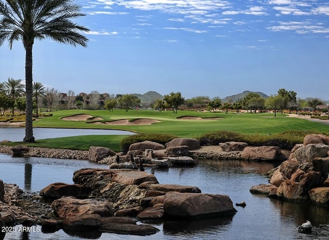 644 E Las Puertas Ln, Queen Creek, AZ 85140 - view of home's community with view of golf course, a lawn, and a water and mountain view