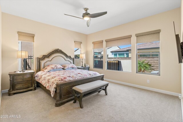 644 E Las Puertas Ln, Queen Creek, AZ 85140 - bedroom with ceiling fan, light colored carpet, and baseboards