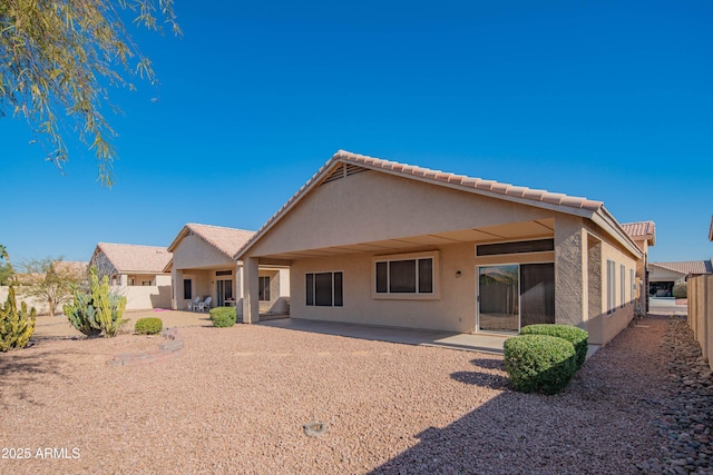 rear view of property with a patio area