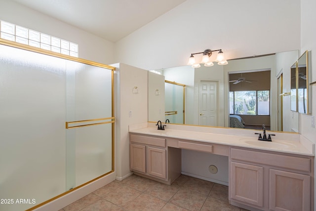 bathroom featuring vanity, an enclosed shower, and tile patterned floors