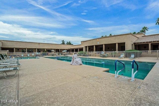 view of pool featuring a patio area