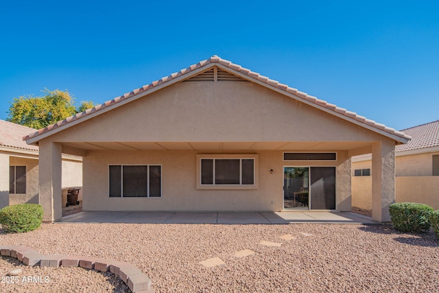 back of house featuring a patio