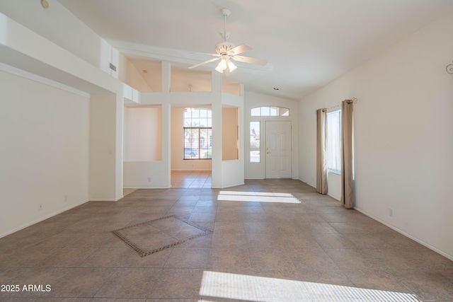 interior space with ceiling fan and lofted ceiling