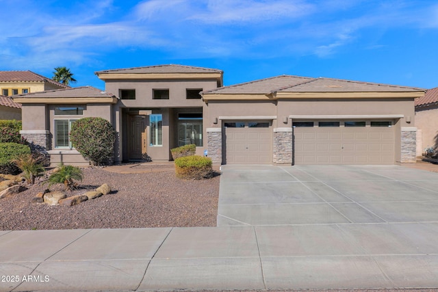 prairie-style house featuring a garage