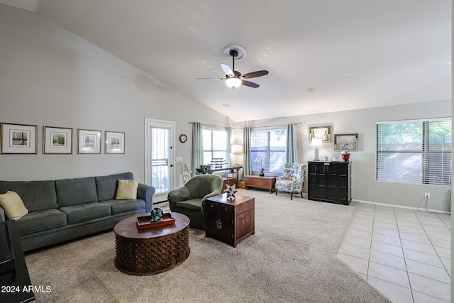 living room with high vaulted ceiling, light tile patterned floors, and ceiling fan