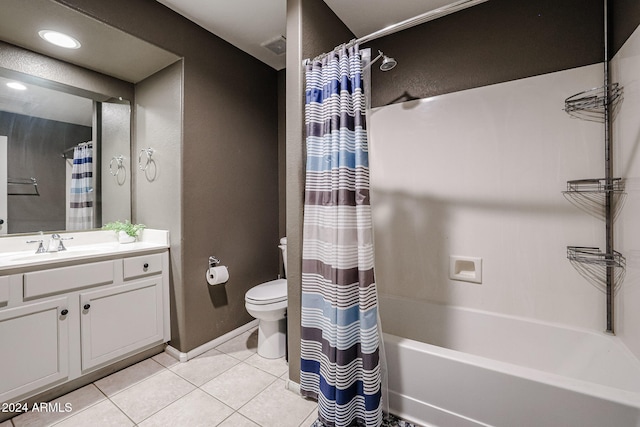 full bathroom with vanity, tile patterned floors, toilet, and shower / bath combination with curtain