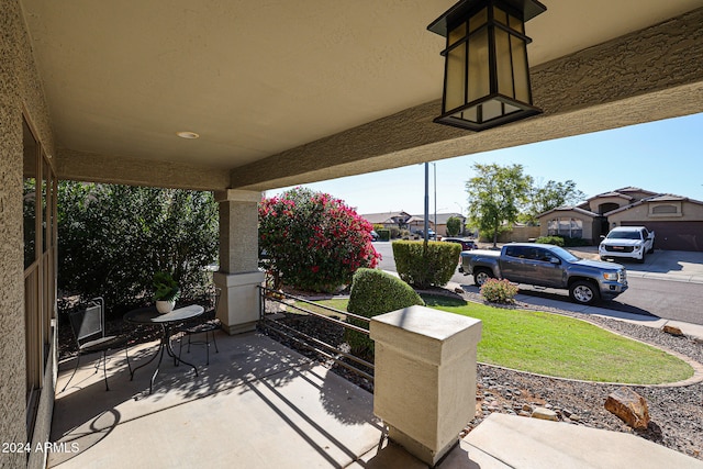 view of patio featuring a porch