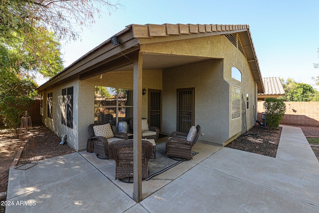 rear view of property with a patio