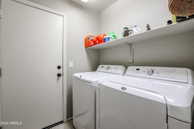 laundry area with washer and clothes dryer