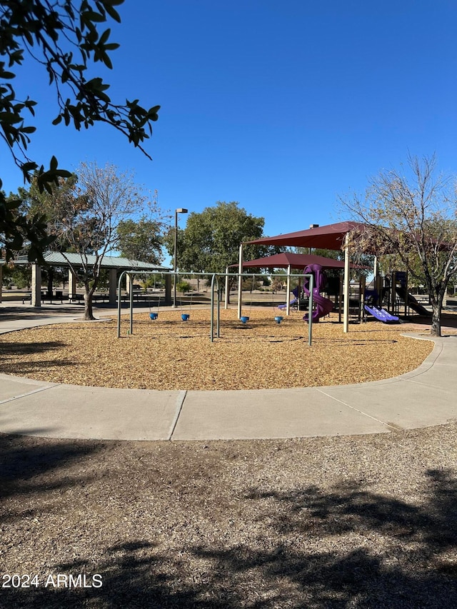 view of home's community with a playground