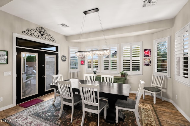 27276 N 81st Ln, Peoria, AZ 85383 - dining room with wood finished floors and plenty of natural light