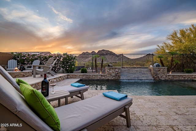 27276 N 81st Ln, Peoria, AZ 85383 - view of pool featuring a fire pit, a patio area, and a fenced backyard