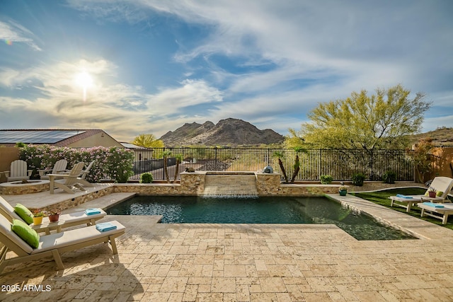 27276 N 81st Ln, Peoria, AZ 85383 - view of swimming pool with a mountain view, a fire pit, a fenced backyard, and a patio