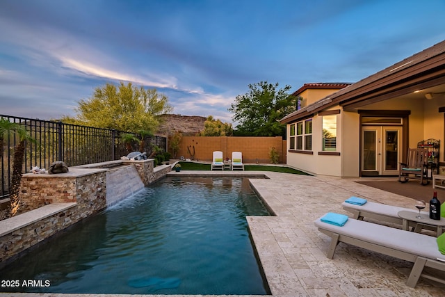 27276 N 81st Ln, Peoria, AZ 85383 - view of swimming pool with a fenced backyard, a patio, and exterior kitchen