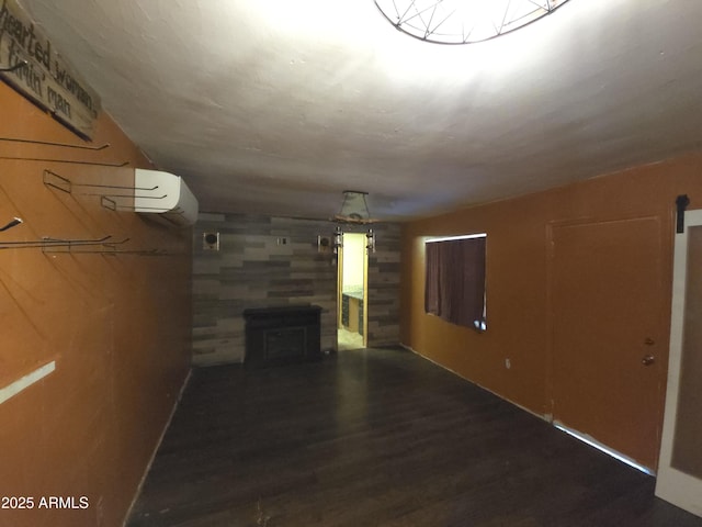 unfurnished living room featuring dark hardwood / wood-style flooring