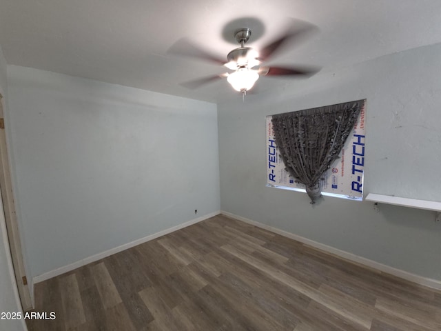 spare room featuring ceiling fan and hardwood / wood-style floors