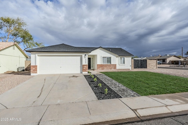 ranch-style home featuring a garage, a front yard, and cooling unit