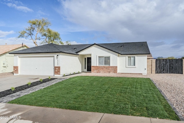 single story home featuring a garage and a front lawn