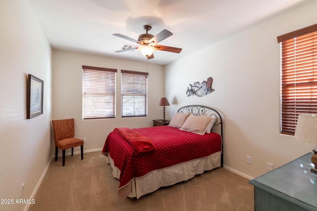 bedroom featuring carpet flooring, a ceiling fan, and baseboards