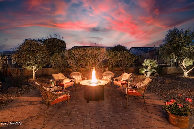 view of patio / terrace with a fenced backyard and an outdoor fire pit