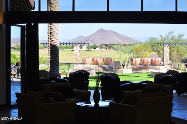 exterior space with fence and a mountain view