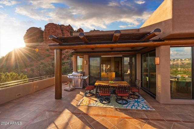 patio terrace at dusk with grilling area