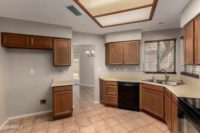 9002 W Caribbean Ln, Peoria, AZ 85381 - kitchen featuring black appliances, a sink, brown cabinets, and healthy amount of natural light
