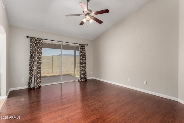 9002 W Caribbean Ln, Peoria, AZ 85381 - spare room with vaulted ceiling, wood finished floors, a ceiling fan, and baseboards