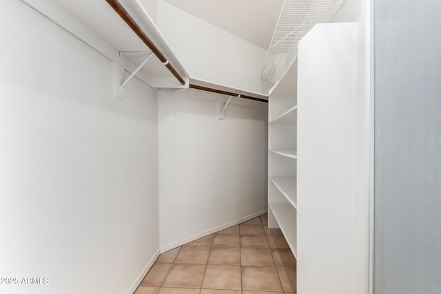 9002 W Caribbean Ln, Peoria, AZ 85381 - walk in closet with light tile patterned floors