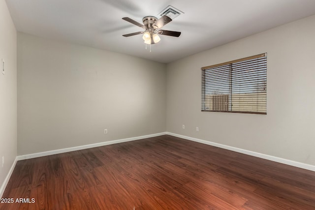 9002 W Caribbean Ln, Peoria, AZ 85381 - empty room featuring baseboards, a ceiling fan, and dark wood finished floors
