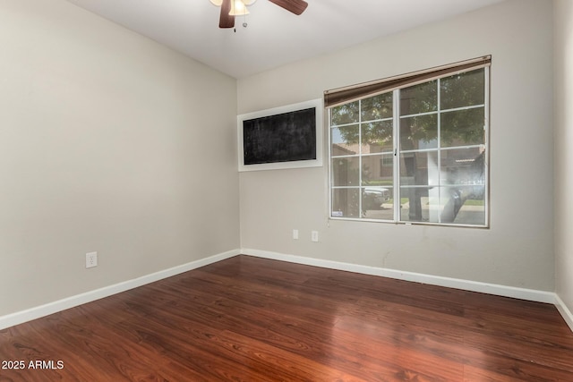 9002 W Caribbean Ln, Peoria, AZ 85381 - empty room with ceiling fan, baseboards, and wood finished floors