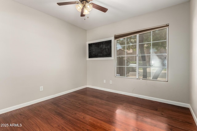 9002 W Caribbean Ln, Peoria, AZ 85381 - empty room featuring ceiling fan, baseboards, and wood finished floors