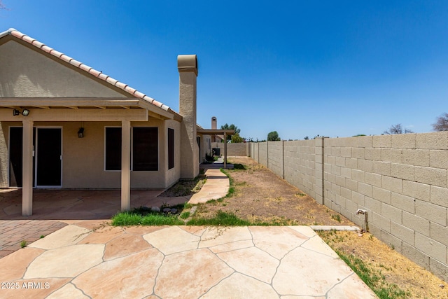 9002 W Caribbean Ln, Peoria, AZ 85381 - fenced backyard with a patio