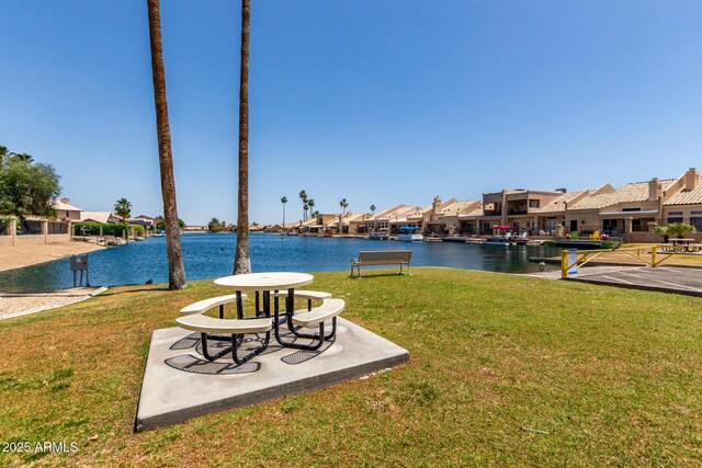 9002 W Caribbean Ln, Peoria, AZ 85381 - view of green lawn with a residential view and a water view