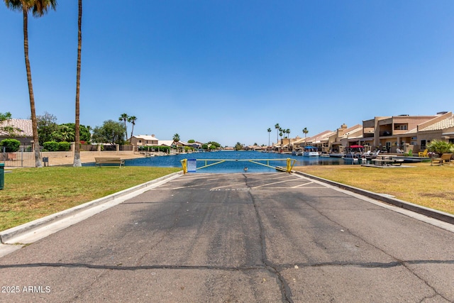 9002 W Caribbean Ln, Peoria, AZ 85381 - view of asphalt street featuring curbs and a residential view