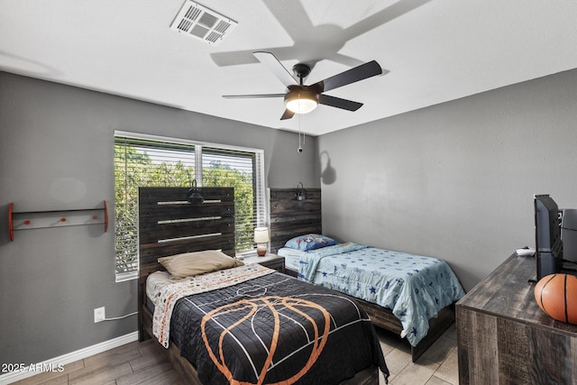 6605 W Altadena Ave, Glendale, AZ 85304 - bedroom with wood finished floors and a ceiling fan