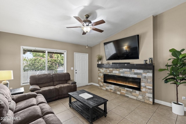 6605 W Altadena Ave, Glendale, AZ 85304 - tiled living area with ceiling fan, a stone fireplace, and lofted ceiling